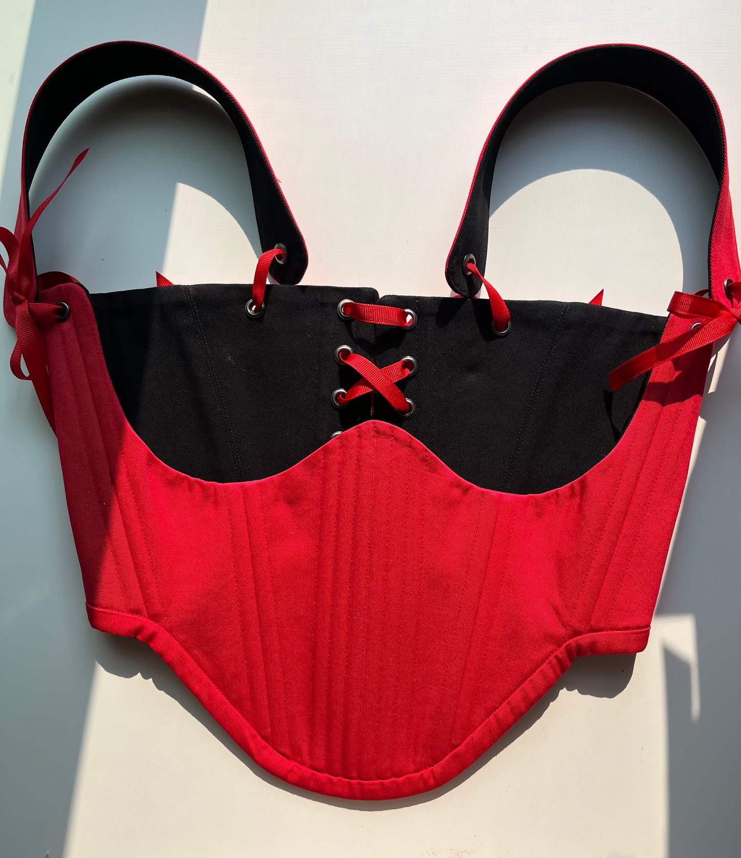 Black and red reversible underbust corsage with removable shoulder straps