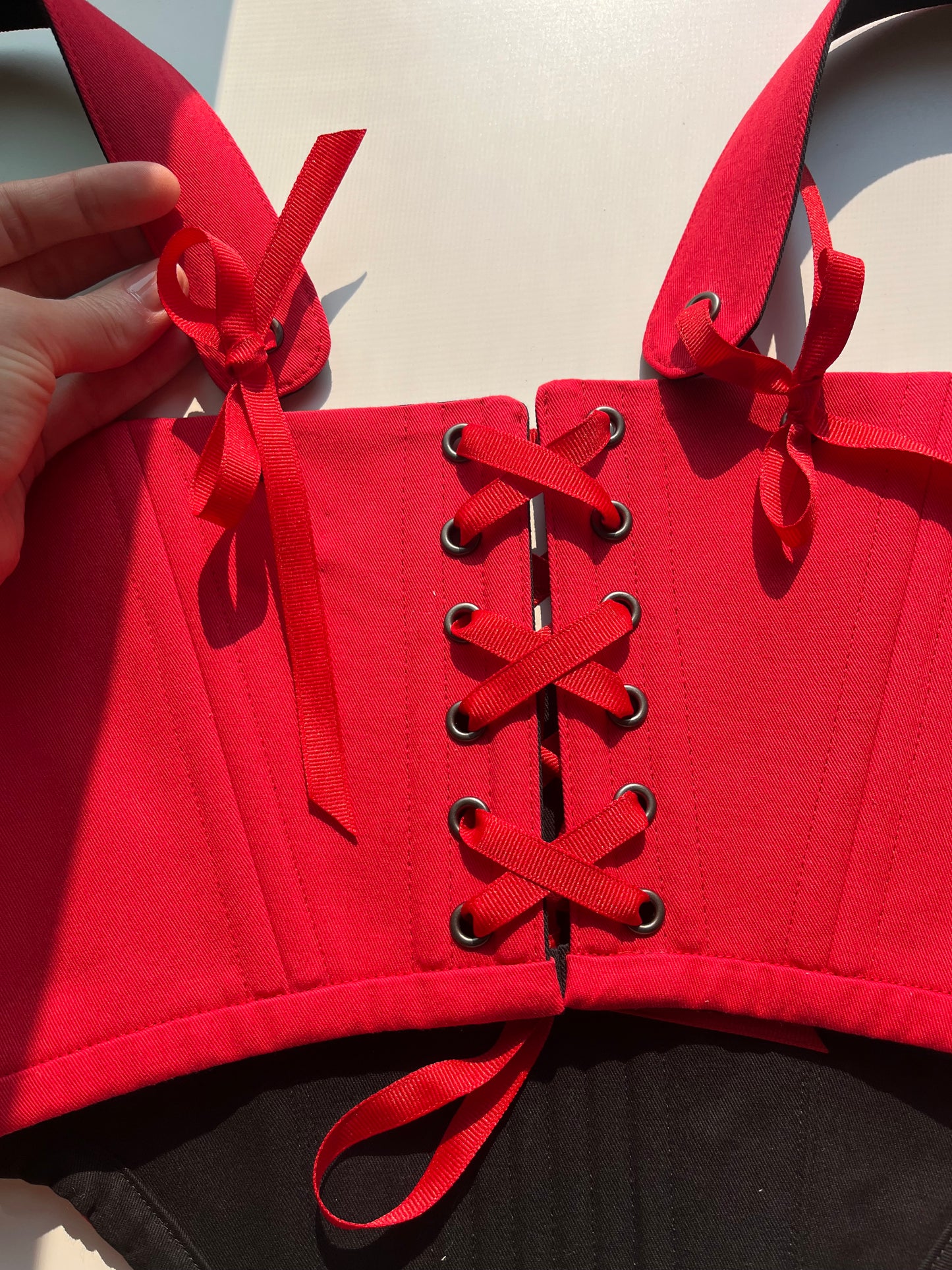 Black and red reversible underbust corsage with removable shoulder straps