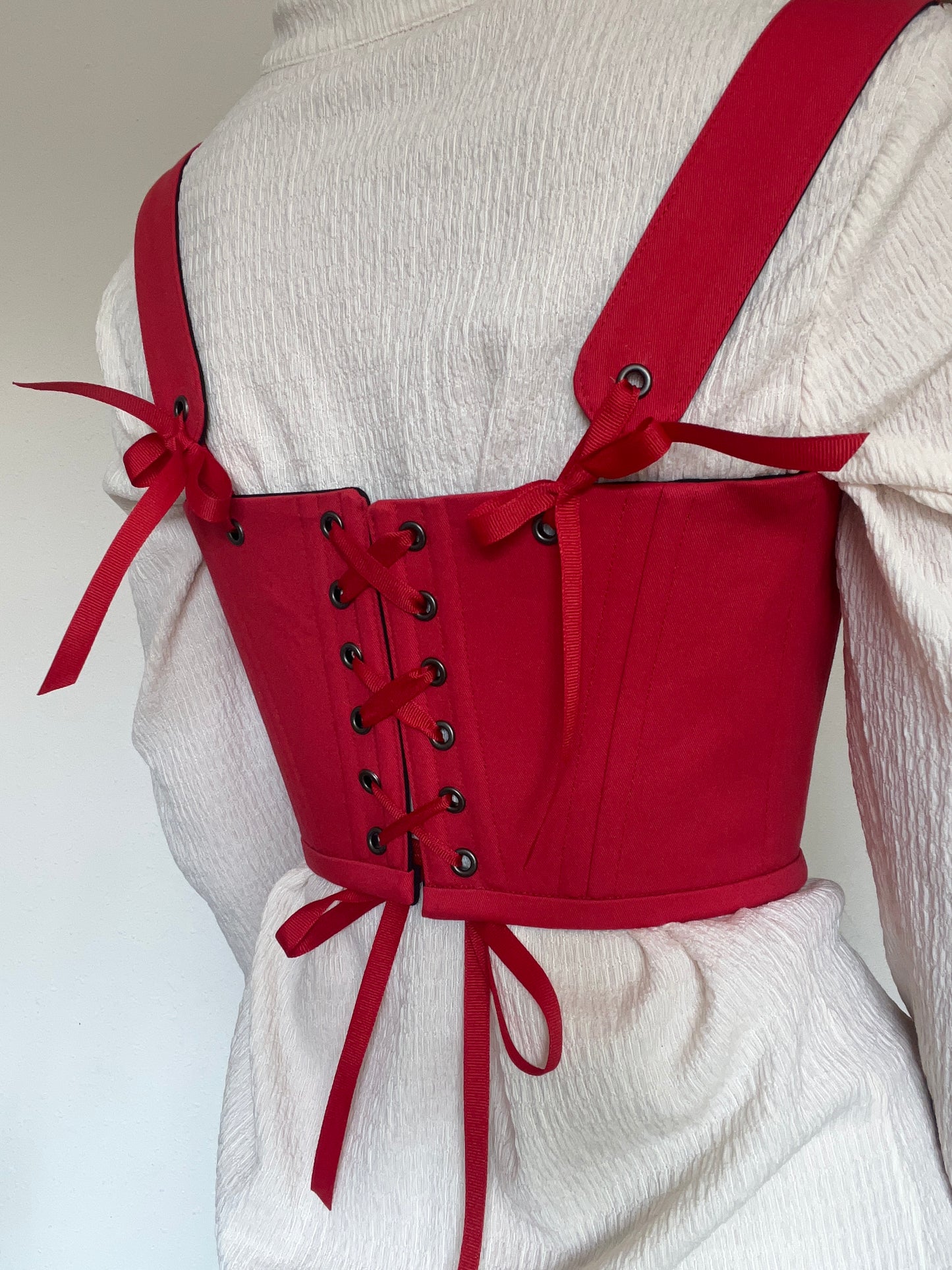 Black and red reversible underbust corsage with removable shoulder straps
