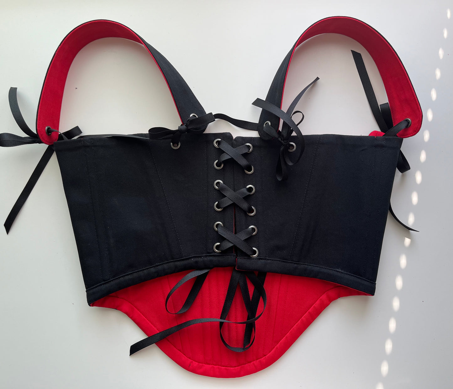 Black and red reversible underbust corsage with removable shoulder straps