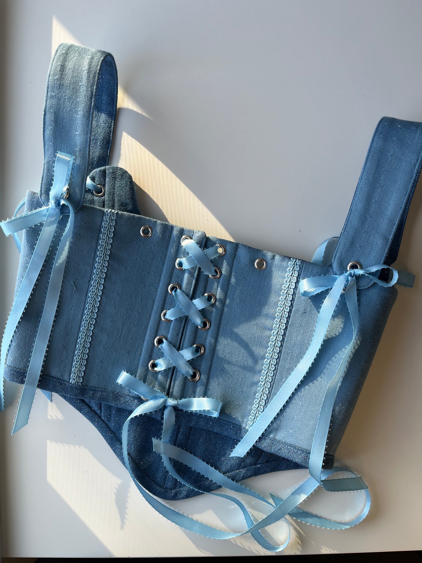Size S Reversible corset in sparkly denim on one side and blue with trim on the other 🩵