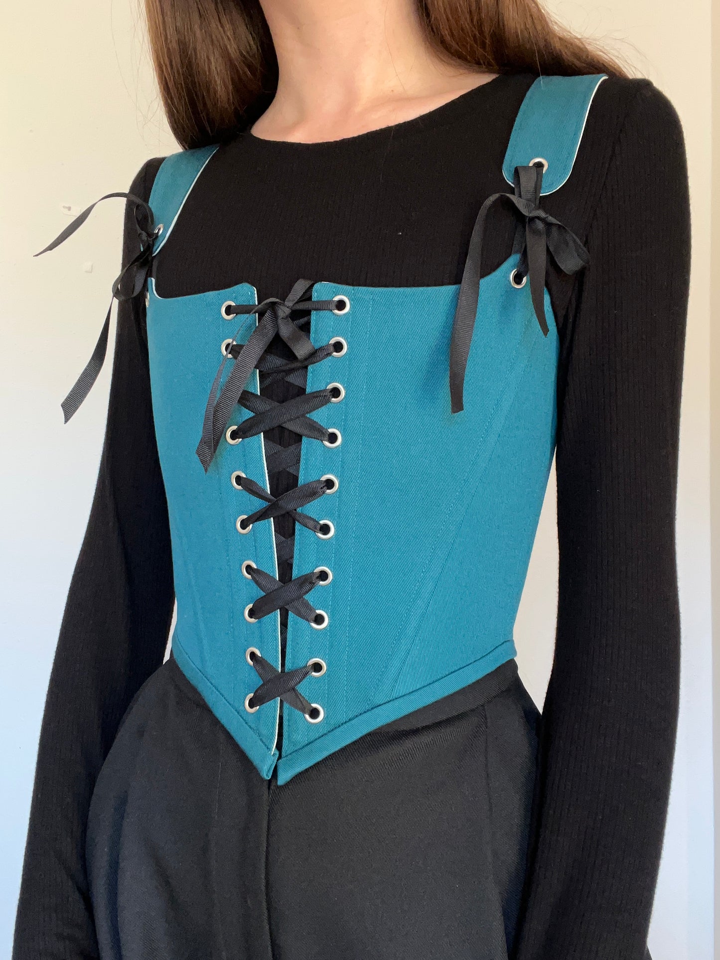 Teal corset with front and back ties, removable shoulder straps,