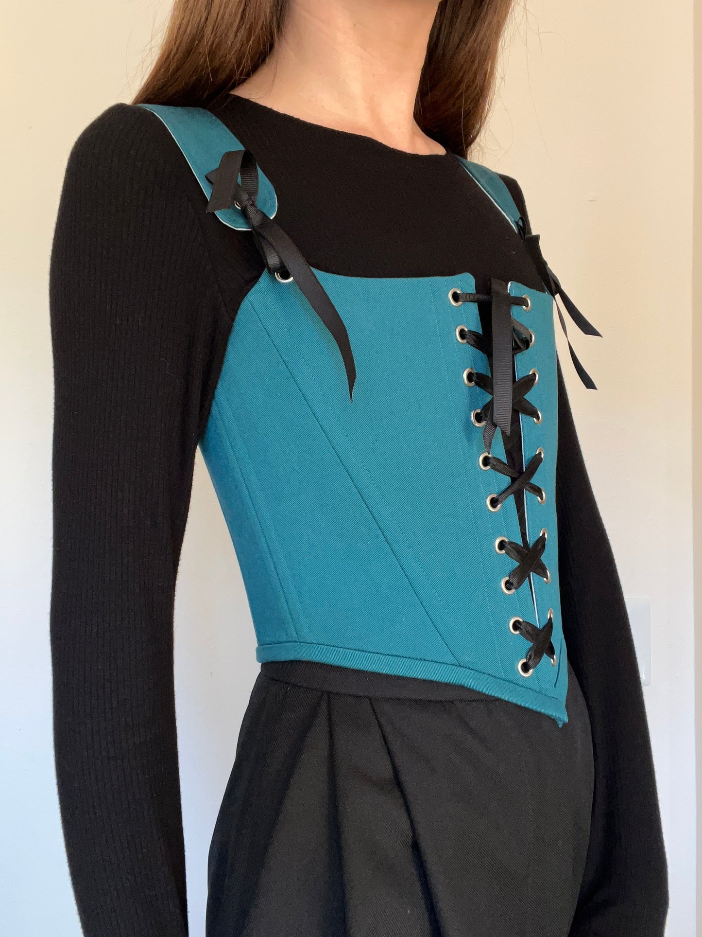 Teal corset with front and back ties, removable shoulder straps,